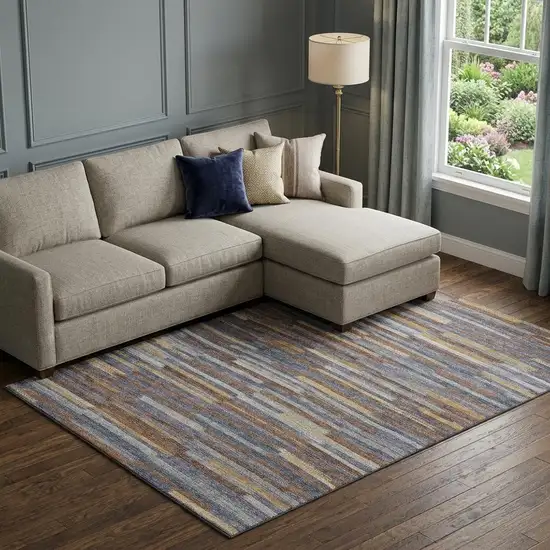 Blue Gold And Brown Abstract Washable Area Rug With UV Protection Photo 1