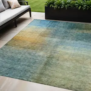 Photo of Blue Gold And Green Abstract Washable Indoor Outdoor Area Rug