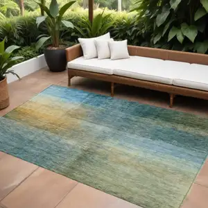 Photo of Blue Gold And Green Abstract Washable Indoor Outdoor Area Rug