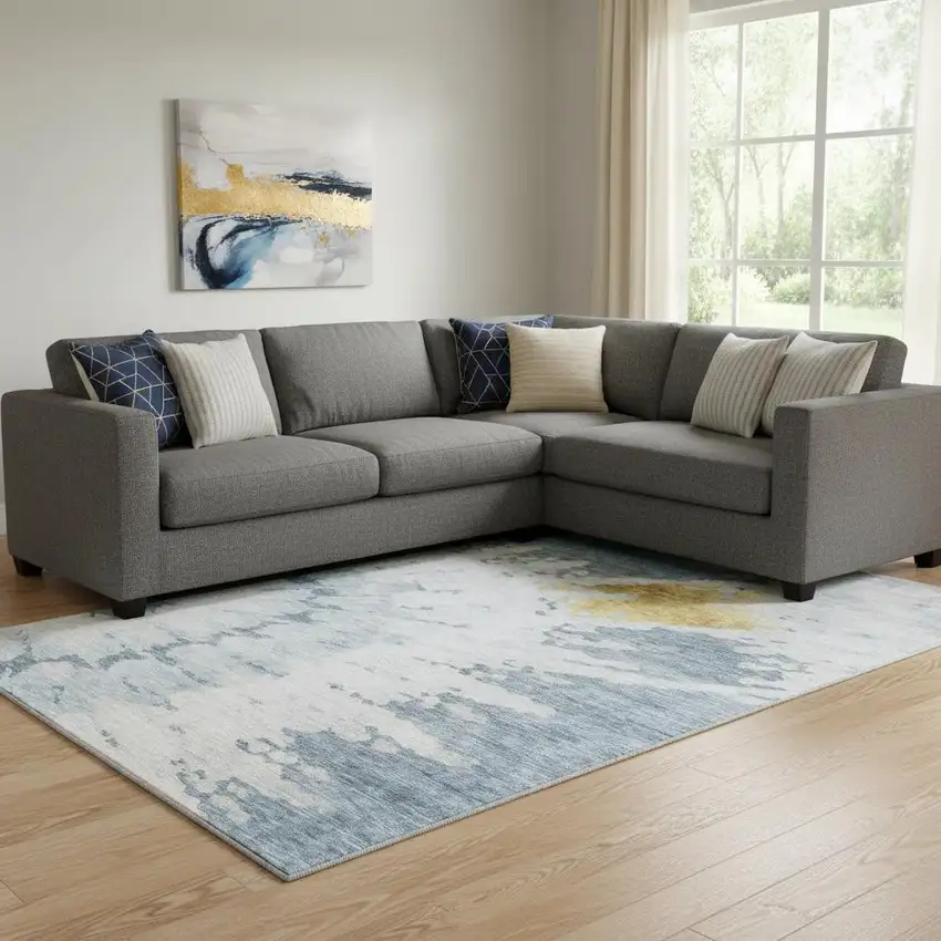 Blue Gold And Ivory Abstract Washable Area Rug With UV Protection Photo 1