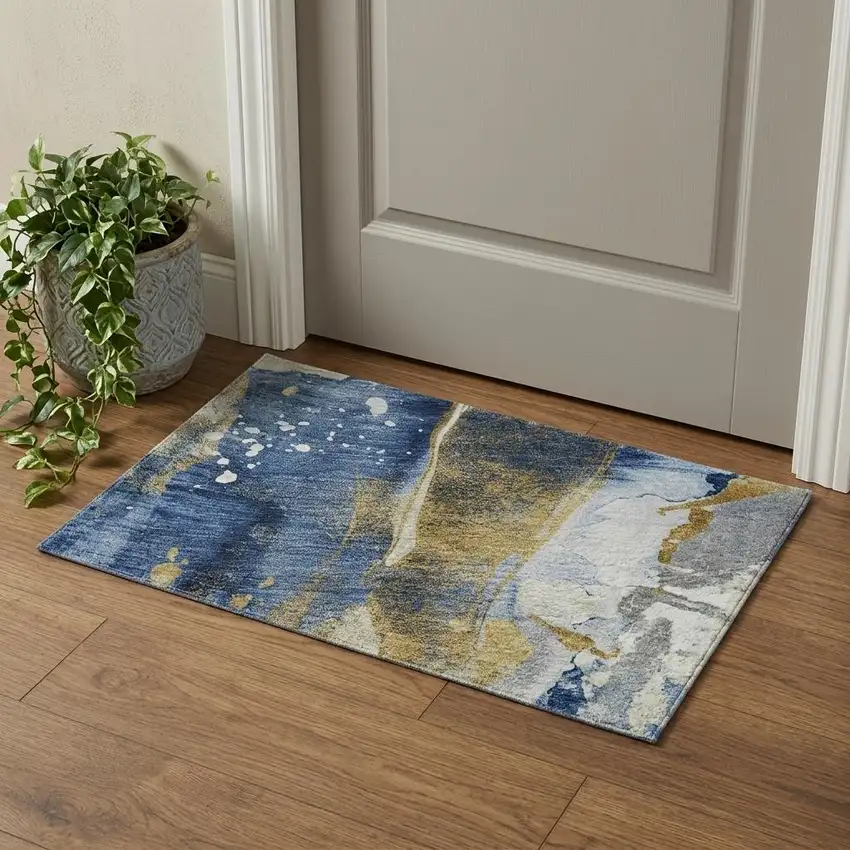 Blue Gold And Ivory Abstract Washable Area Rug With UV Protection Photo 1