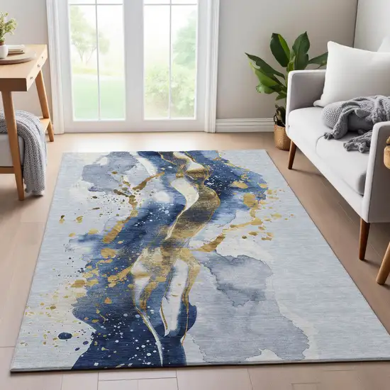 Blue Gold And Ivory Abstract Washable Area Rug With UV Protection Photo 3