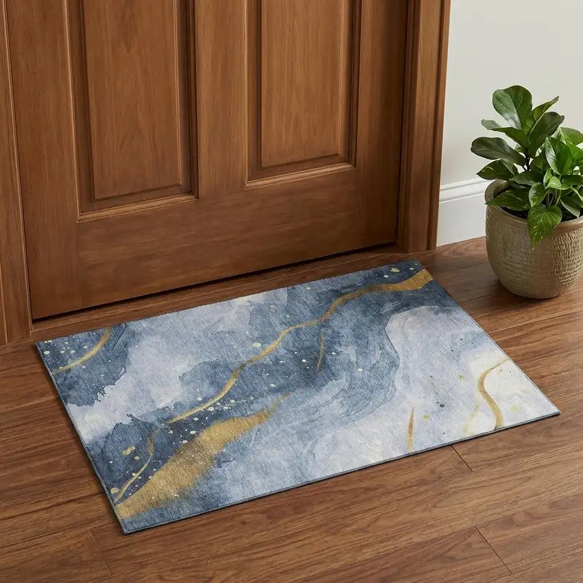 Blue Gold And Ivory Abstract Washable Area Rug With UV Protection Photo 1