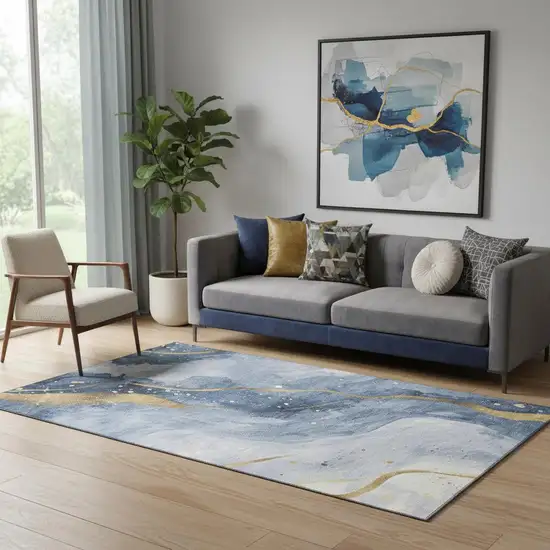 Blue Gold And Ivory Abstract Washable Area Rug With UV Protection Photo 2