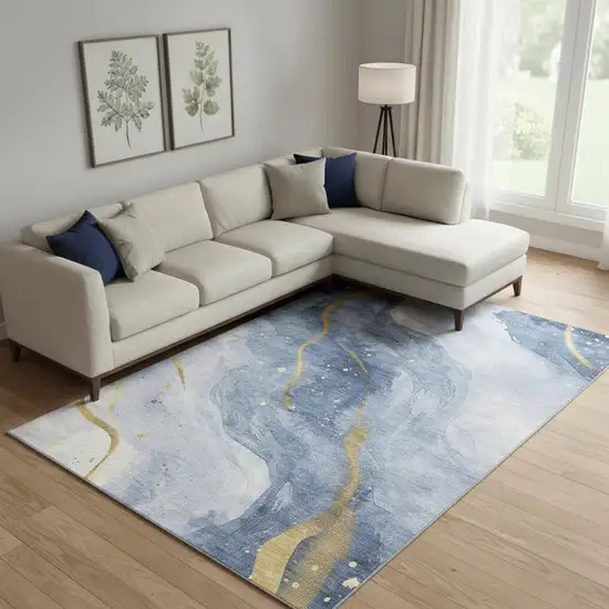 Blue Gold And Ivory Abstract Washable Area Rug With UV Protection Photo 2