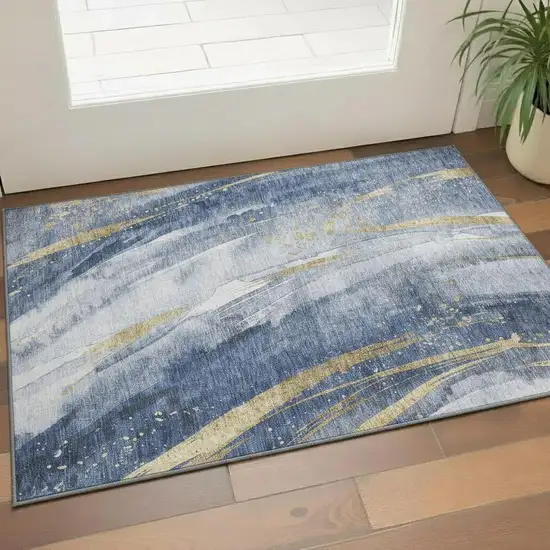 Blue Gold And Ivory Abstract Washable Area Rug With UV Protection Photo 2