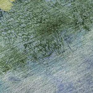 Photo of Blue Gold And Ivory Abstract Washable Area Rug With UV Protection