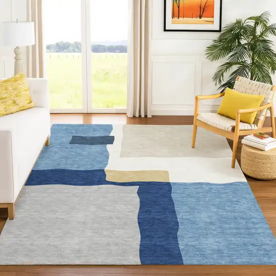 Blue Gold And Ivory Abstract Washable Indoor Outdoor Area Rug Photo 5