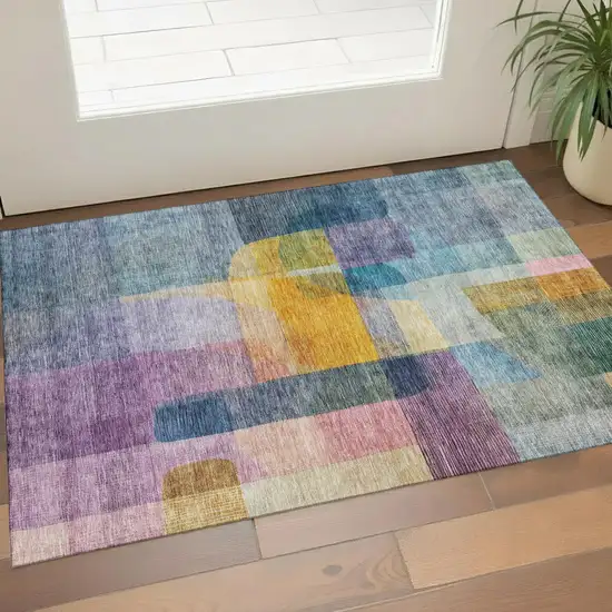 Blue Gold And Purple Abstract Washable Area Rug With UV Protection Photo 1
