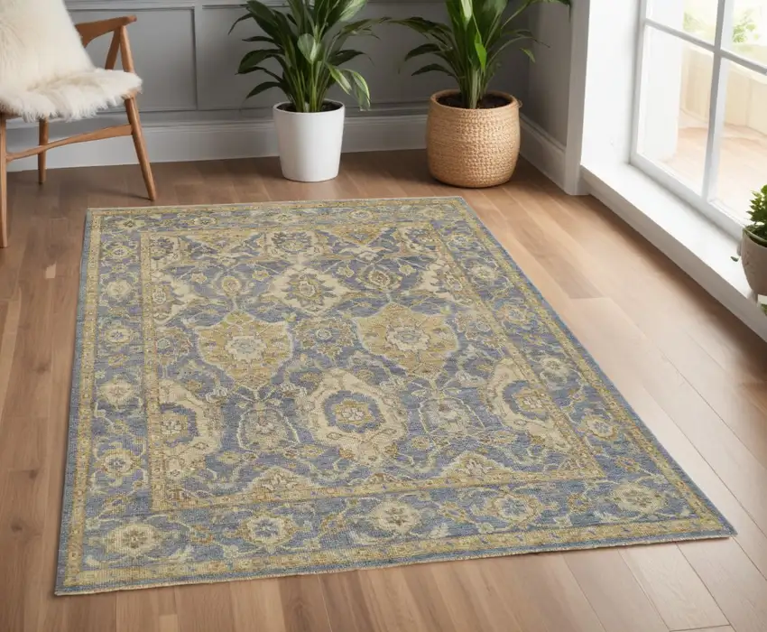 Blue and Gold Wool Floral Hand Knotted Area Rug With Fringe Photo 1