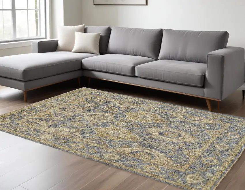 Blue Gold And Tan Wool Floral Hand Knotted Stain Resistant Area Rug With Fringe Photo 1