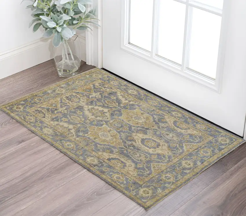 Blue and Gold Wool Floral Hand Knotted Area Rug With Fringe Photo 1