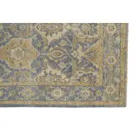Photo of Blue Gold And Tan Wool Floral Hand Knotted Stain Resistant Area Rug With Fringe