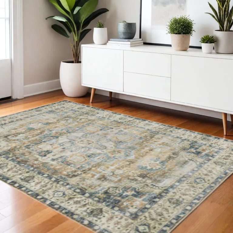 Blue Gold Brown Green And Salmon Oriental Printed Stain Resistant Non Skid Area Rug Photo 1