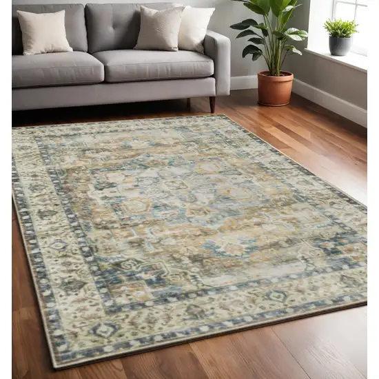 Blue Gold Brown Green And Salmon Oriental Printed Stain Resistant Non Skid Area Rug Photo 1
