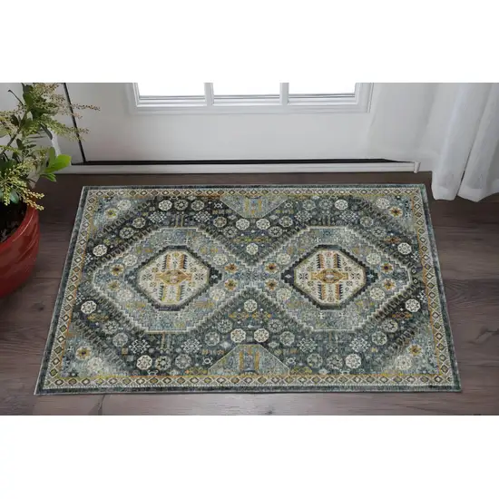 Blue Gold Ivory And Navy Oriental Power Loom Stain Resistant Area Rug With Fringe Photo 1