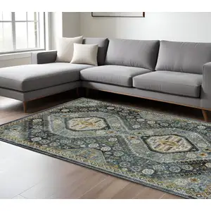Photo of Blue Gold Ivory And Navy Oriental Power Loom Stain Resistant Area Rug With Fringe