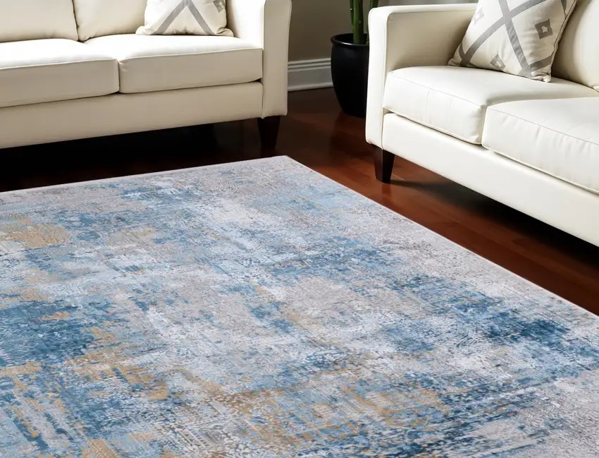 Blue Gold and Gray Abstract Power Loom Area Rug With Fringe Photo 1