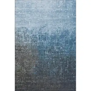 Photo of Blue Gray And Charcoal Ombre Washable Area Rug With UV Protection