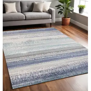 Photo of Blue Gray And Cream Abstract Area Rug
