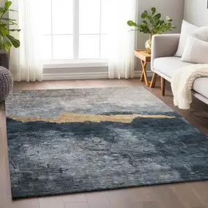 Photo of Blue Gray And Gold Abstract Washable Indoor Outdoor Area Rug