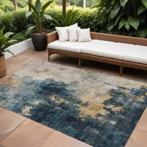 Photo of Blue Gray And Gold Abstract Washable Indoor Outdoor Area Rug