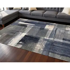 Photo of Blue Gray And Ivory Abstract Area Rug