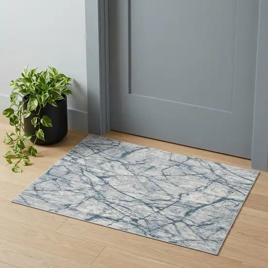 Blue Gray And Ivory Abstract Distressed Stain Resistant Area Rug Photo 1