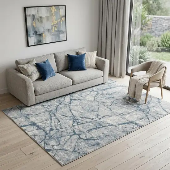 Blue Gray And Ivory Abstract Distressed Stain Resistant Area Rug Photo 1
