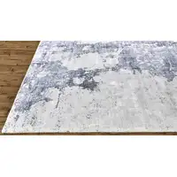 Photo of Blue Gray And Ivory Abstract Hand Woven Area Rug
