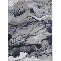Photo of Blue Gray And Ivory Abstract Power Loom Stain Resistant Area Rug