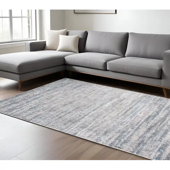 Ivory Gray And Blue Abstract Area Rug Photo 1