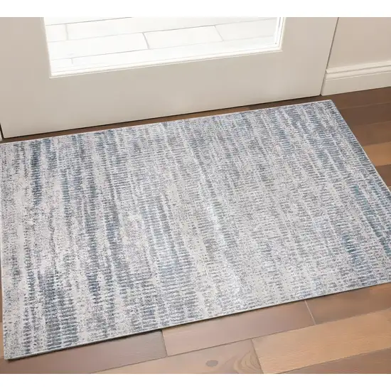 Ivory Gray And Blue Abstract Area Rug Photo 1