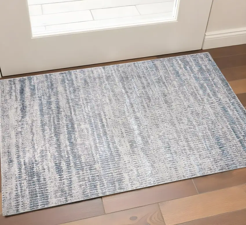 Ivory Gray And Blue Abstract Area Rug Photo 1