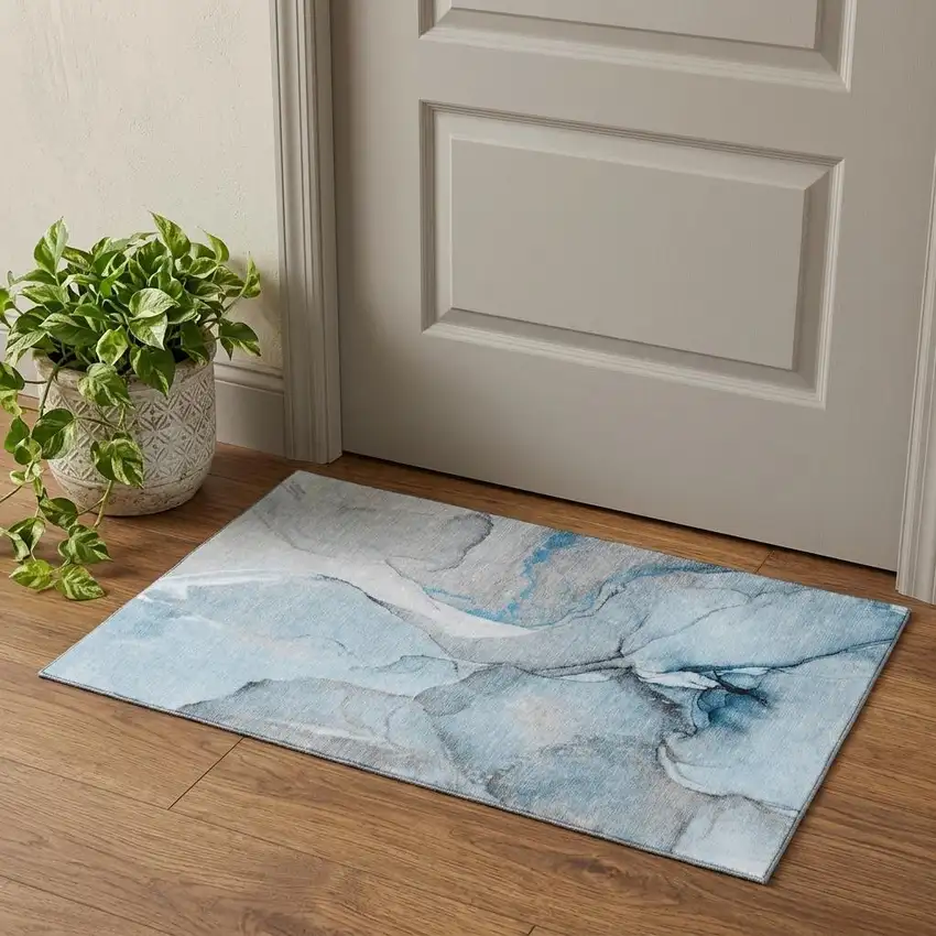 Blue Gray And Ivory Abstract Washable Area Rug With UV Protection Photo 1