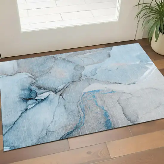 Blue Gray And Ivory Abstract Washable Area Rug With UV Protection Photo 1