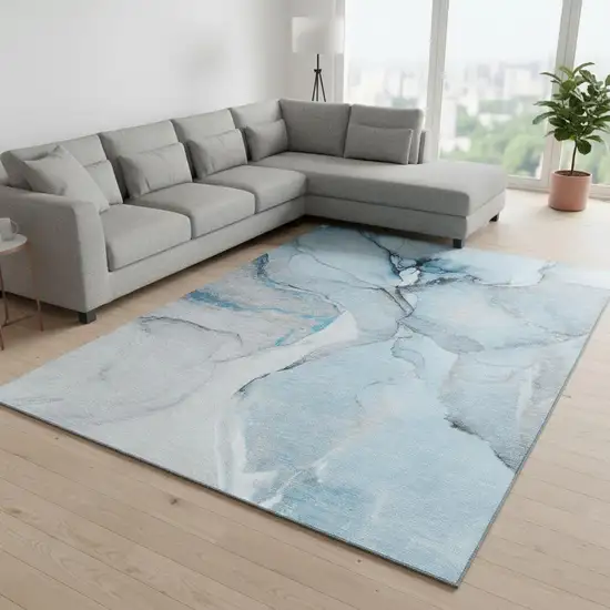Blue Gray And Ivory Abstract Washable Area Rug With UV Protection Photo 1