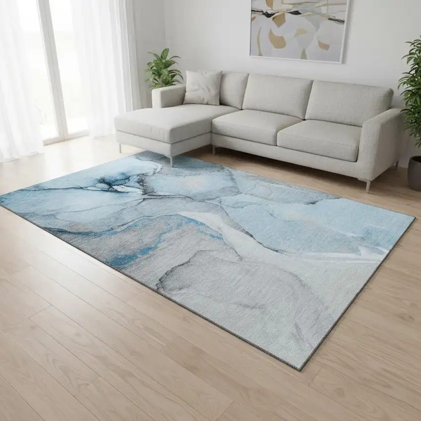 Blue Gray And Ivory Abstract Washable Area Rug With UV Protection Photo 1
