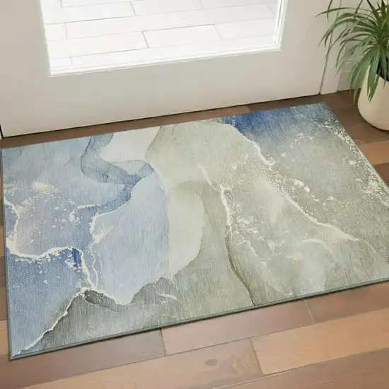 Blue Gray And Ivory Abstract Washable Area Rug With UV Protection Photo 1