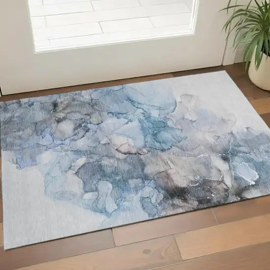 Blue Gray And Ivory Abstract Washable Area Rug With UV Protection Photo 1