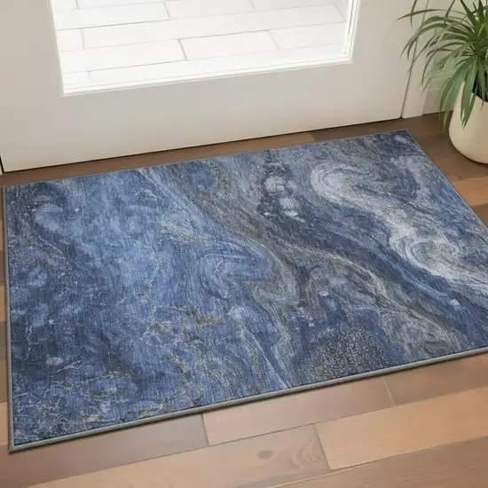 Blue Gray And Ivory Abstract Washable Area Rug With UV Protection Photo 1