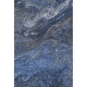 Photo of Blue Gray And Ivory Abstract Washable Area Rug With UV Protection