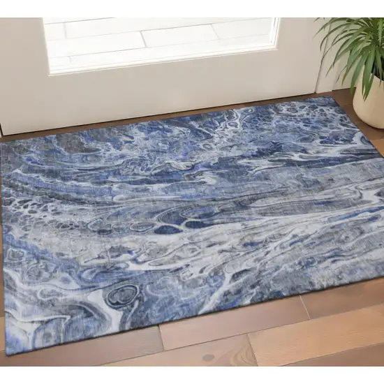 Blue Gray And Ivory Abstract Washable Area Rug With UV Protection Photo 1