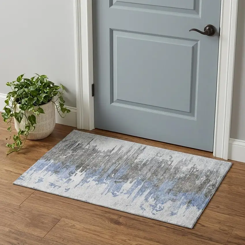 Blue Gray And Ivory Abstract Washable Area Rug With UV Protection Photo 1