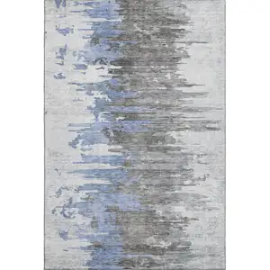 Photo of Blue Gray And Ivory Abstract Washable Area Rug With UV Protection