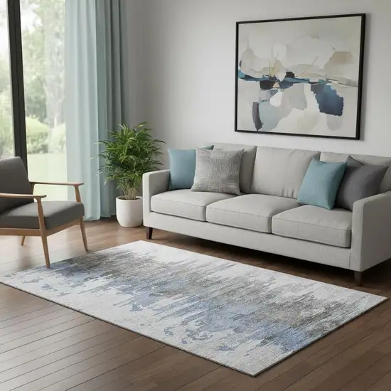 Blue Gray And Ivory Abstract Washable Area Rug With UV Protection Photo 1