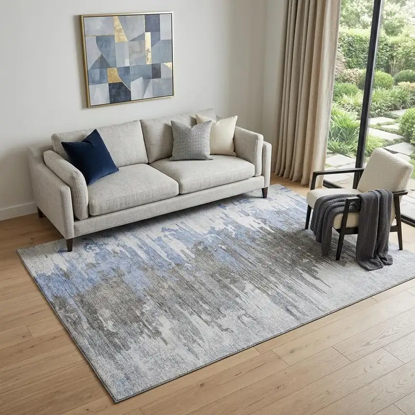 Blue Gray And Ivory Abstract Washable Area Rug With UV Protection Photo 1