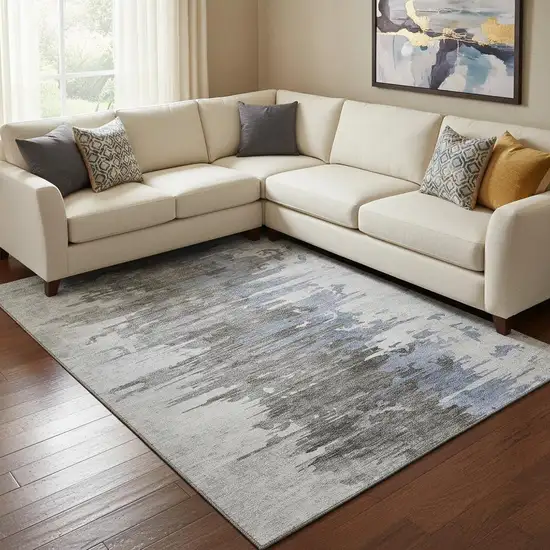 Blue Gray And Ivory Abstract Washable Area Rug With UV Protection Photo 1