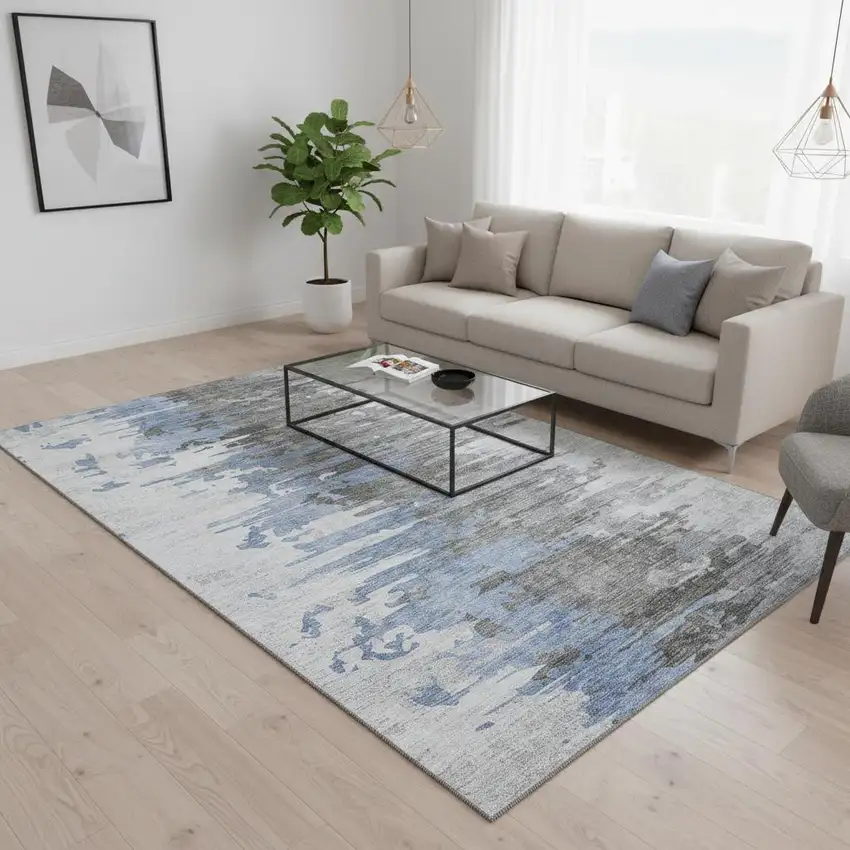 Blue Gray And Ivory Abstract Washable Area Rug With UV Protection Photo 1