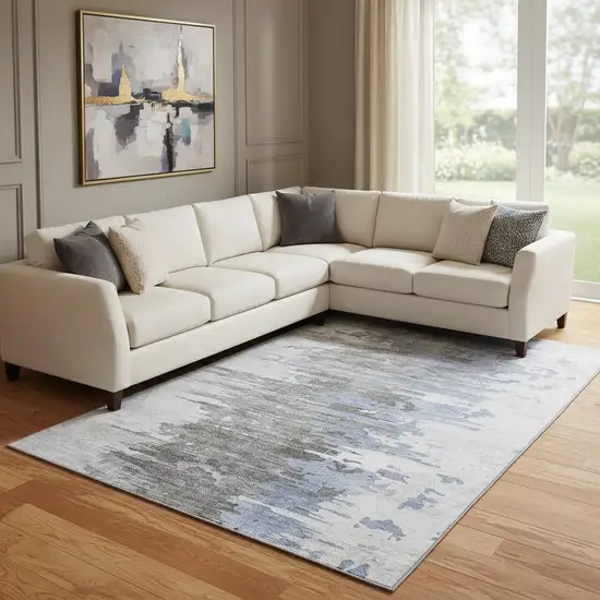 Blue Gray And Ivory Abstract Washable Area Rug With UV Protection Photo 1